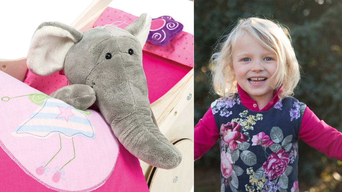 Vorschaubild Kollektion Happy Fee mit Kind und Puppenwagen in Natur mit pinken Textilien