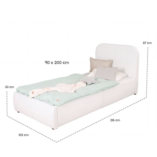 Gráfico de medidas de la cama infantil blanca: superficie de descanso 90×200 cm, medidas totales 216×102×87 cm, arcón 30 cm.
