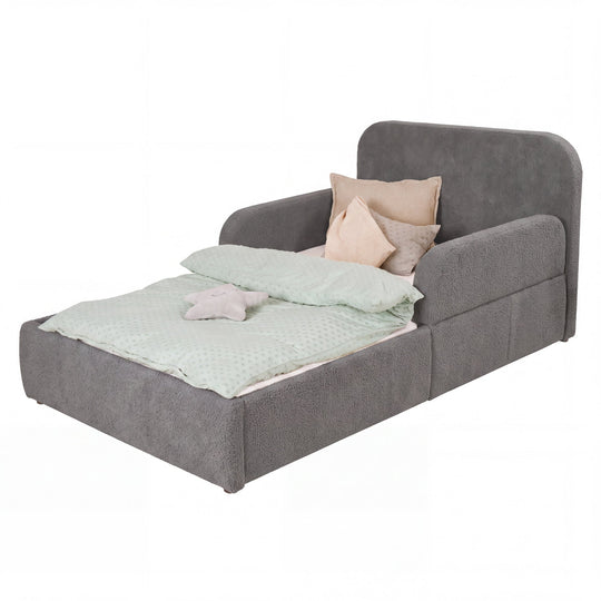 Grey bouclé bed with mint bed linen, cut-out on a white background.