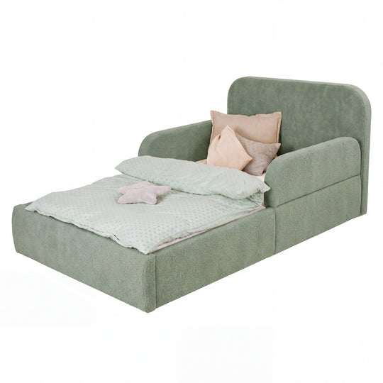 Green roba Little Dream children's bed with headboard and side guards, made up with bed linen. Partially AI-generated.