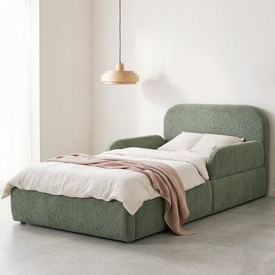 Green roba Little Dream children's bed in a bright children's room with white bed linen and pendant lamp. Fully AI-generated.