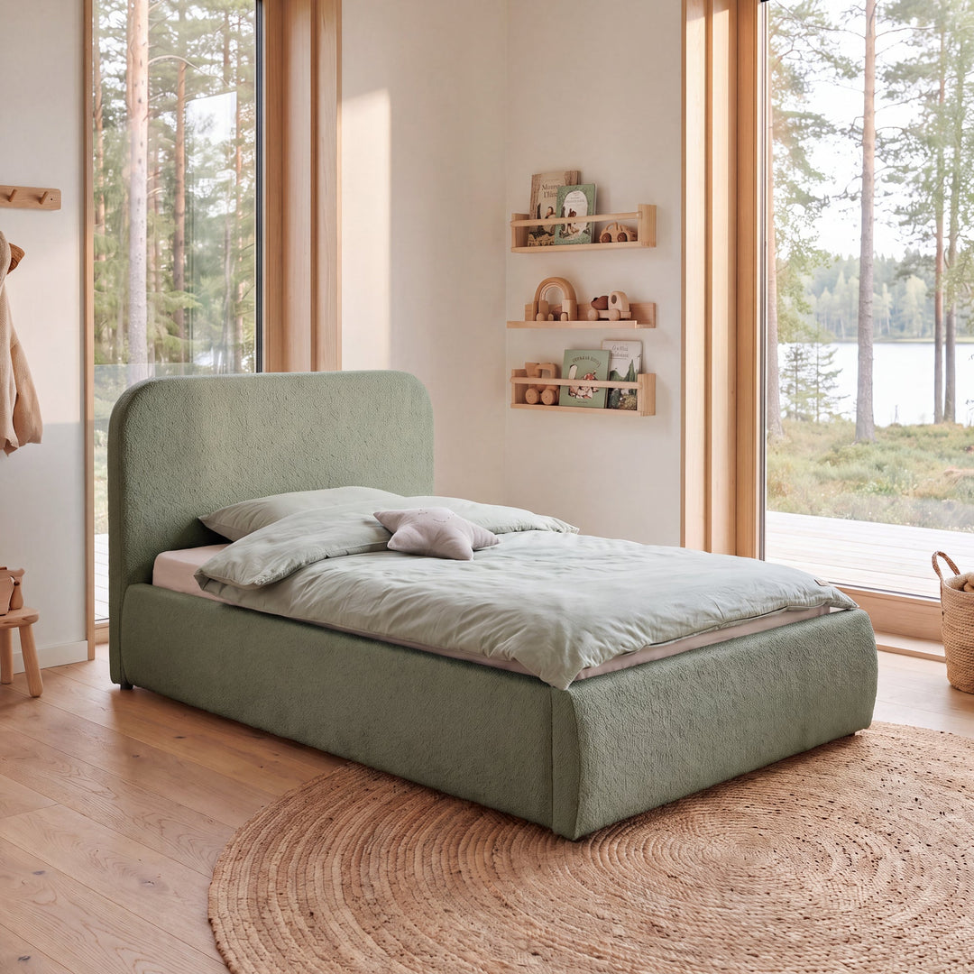 Green roba Little Dream children's bed in a children's room with a window view of the forest and mint green bed linen. Fully AI-generated.
