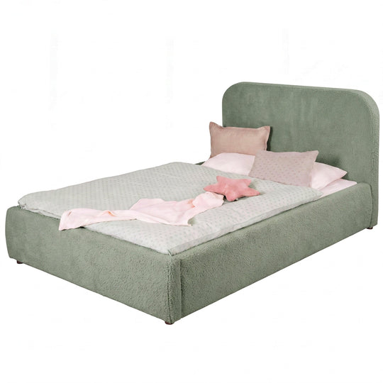 Sage green roba Little Dream children's bed with upholstered headboard, made up with polka-dot bed linen and pillows. Partially AI-generated.