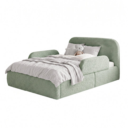 Sage green roba Little Dream children's bed with side guard from a side perspective, with bed linen and cuddly toy. Partially AI-generated.