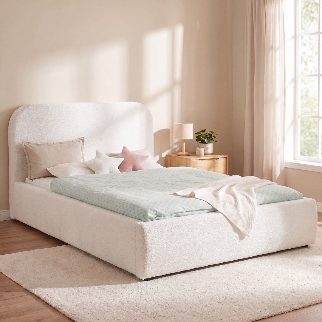 White roba Little Dream children's bed in a bright bedroom with bedside table and reading lamp. Partially AI-generated.