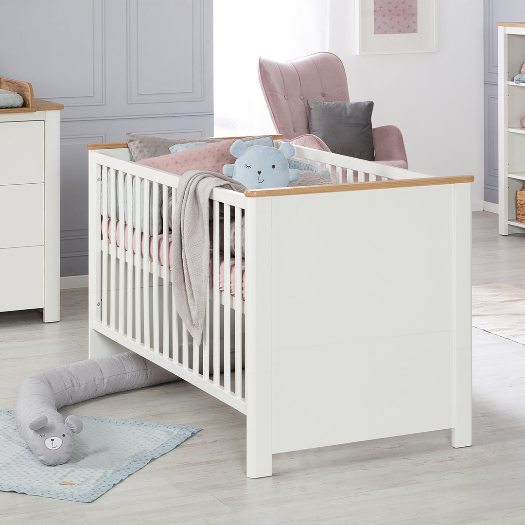 Convertible Cot Bed 'Ava' 70 x1 40 cm, Convertible for Junior Bed, White, Decor in 'Artisan oak' – Lifestyle Image (3/8)